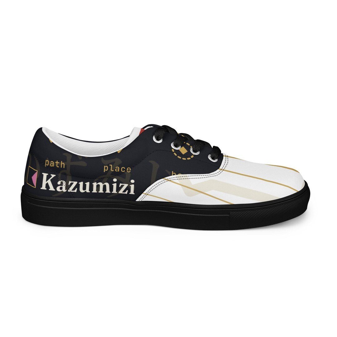 Black lace-up low-top canvas shoes with the Kazumizi diamond in matte black on the side.